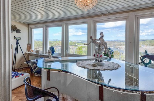 Vastra Frolunda House | Enjoy a wonderful view of the archipelago in this comfortable vacation home with sauna.