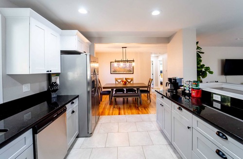 Lamar Heights Area House | Outdoor Oasis: Unwind in the hot tub under twinkling lights in your private retreat!
