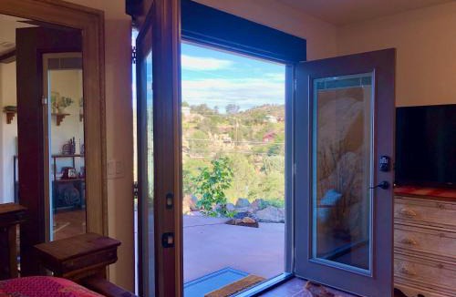 Prescott Apartment | Prickly Pear Unique Studio with bathroom built into the Granite boulders, Amazing Views, Front & back porches, Firepit,Dog friendly