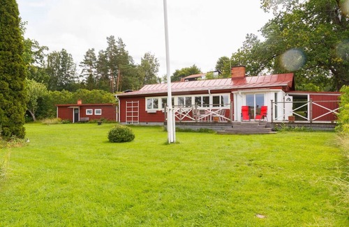 Vasteras Villa | Seaside plot with private jetty, rowing boat & sunset