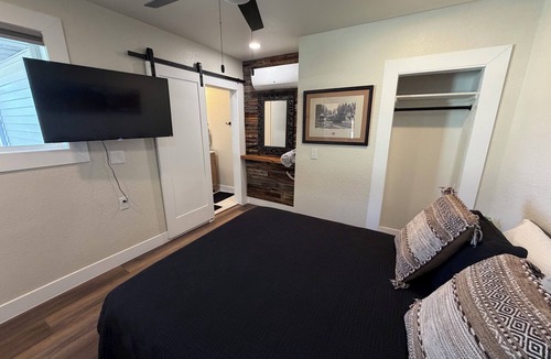 Columbine Apartment | The Cowboy - western inspired them @ the Little Littleton Village