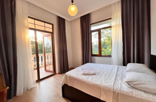 Chakvi Villa | White house with Citrus Garden, 15 min walk to Beach
