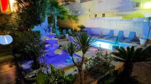 Beach Villa Apartment on top location, with pool, sea view and exotic garden in Split
