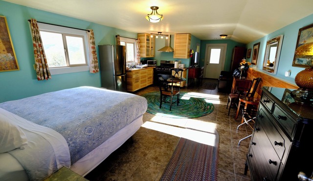 Charming stone clad cabin with views off Highway 140 towards Yosemite in Midpines
