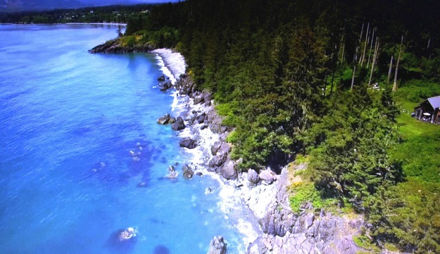 Contemporary Oceanfront Cottage with Private Beaches, Trails, and Gardens in Sooke