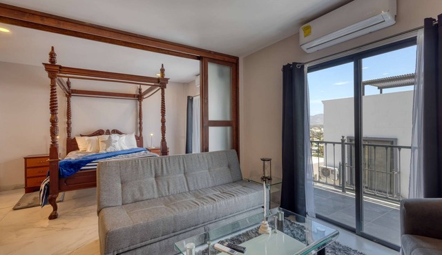 Dog-friendly apartment with rooftop infinity pool, gym, central AC, & balcony in Cabo San Lucas