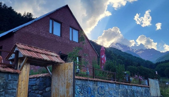 Kazbegi's Peak House: Tranquility and Adventure Await!