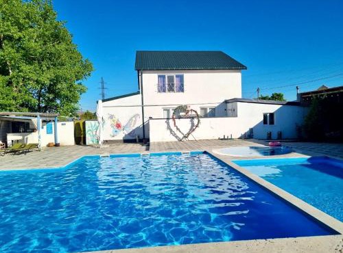 Laguna House next to Pool at Bazaleti Lake