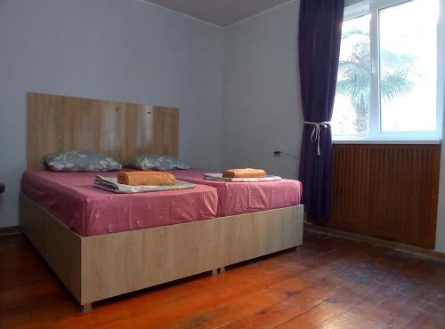 large bedroom with two separate beds