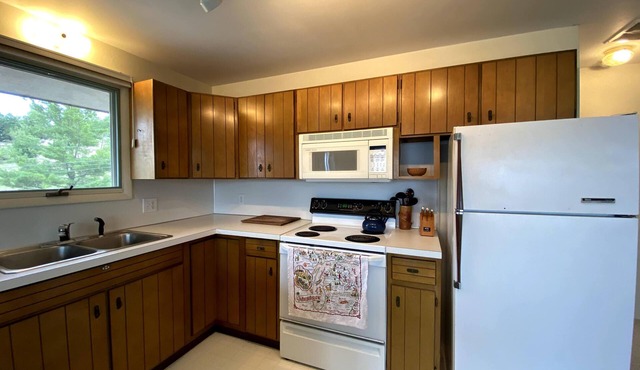 Midcentury Modern Beach Cottage w/100' of private sandy beachfront in Montague