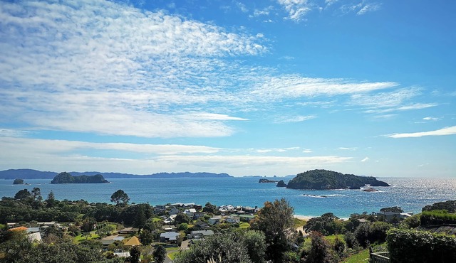 Sweeping panoramic views of Hahei beach and offshore islands in Hahei