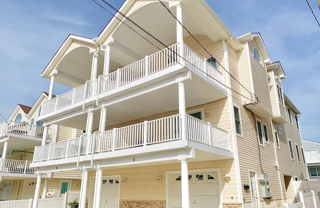 Views of the bay and wetlands from two decks and located in a quiet area away from the hustle and bustle of Sea Isle City's business districts. in Sea Isle City
