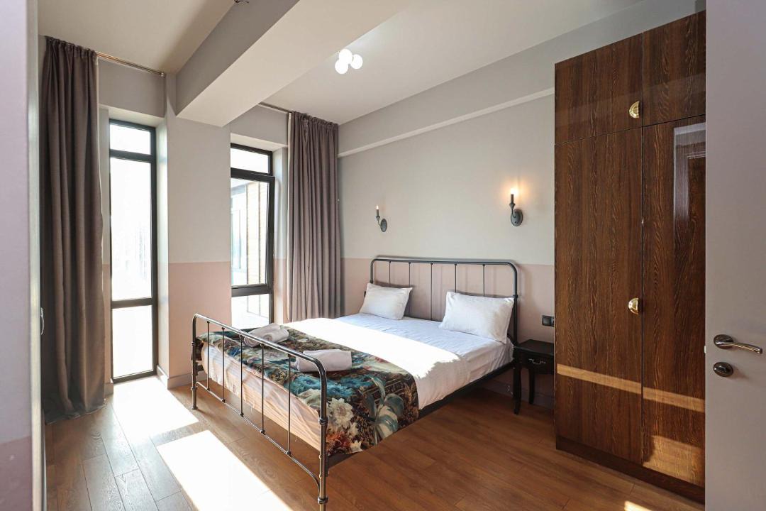 Chugureti Apartment | Wehost Apartment - On-site Pool & Gym - Not Included