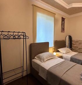Quadruple Room with Shared Bathroom