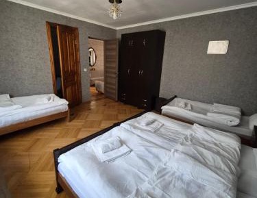 Quadruple Room with Private Bathroom