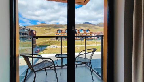 One-Bedroom Apartment with Balcony and Mountain View  