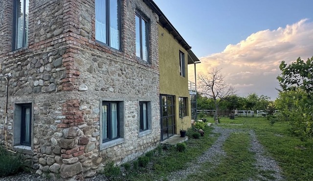 The first floor of a farmhouse with a marani for two in Busheti