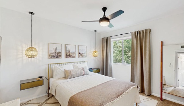Dog-friendly modern stay with a heated private pool, sun room, & grill in Tucson