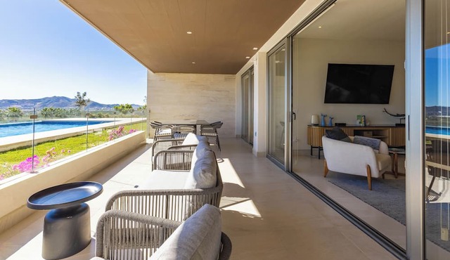 Vista Del Arco at Vista Vela Sunset is a modern 3-bedroom condo with ocean and sunset views, an open layout, and top resort amenities. Enjoy pickleball courts, a fully equipped gym, and a pool just steps from the patio—ideal for a relaxing Cabo stay. in Cabo San Lucas